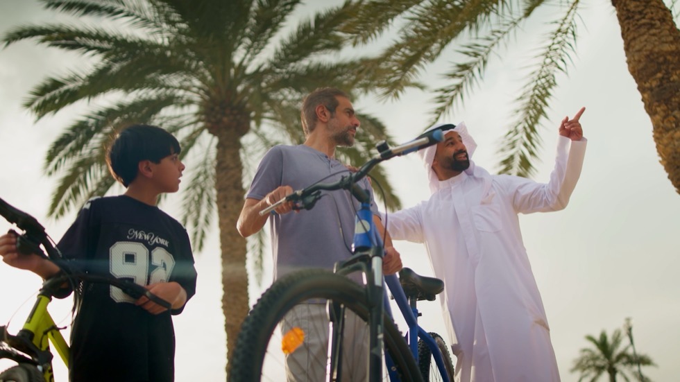 A lifestyle production scene set among palm trees in Kuwait